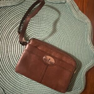 Fossil leather clutch / wristlet.